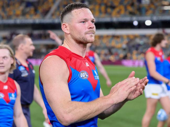 BRISBANE, AUSTRALIA - AUGUST 19: Steven May of the Demons acknowledges fans after the 2022 AFL Round 23 match between the Brisbane Lions and the Melbourne Demons at The Gabba on August 19, 2022 in Brisbane, Australia. (Photo by Russell Freeman/AFL Photos via Getty Images)