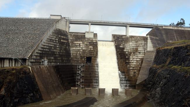 Hinze Dam is overflowing. Photo: Richard Gosling