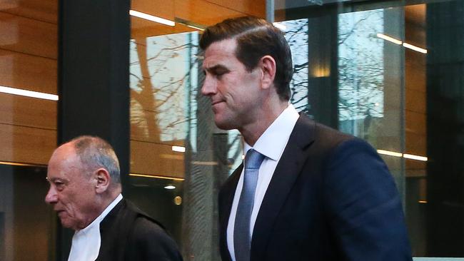 Ben Roberts Smith (right) is seen leaving the Supreme Court. Picture: NCA NewsWire / Gaye Gerard