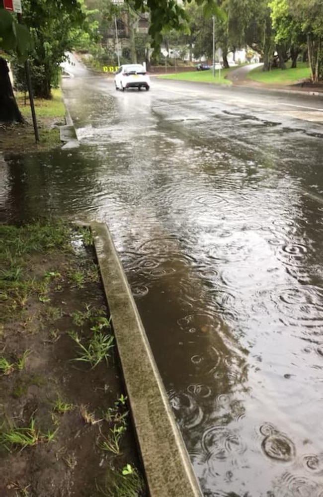 Balgowlah Rd at Manly was starting to flood early on Friday afternoon. Picture: Manly SES