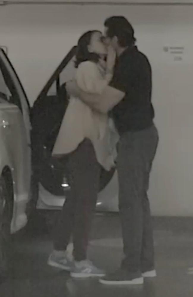 The happy couple were spotted kissing as they got out of the car. Picture: Backgrid