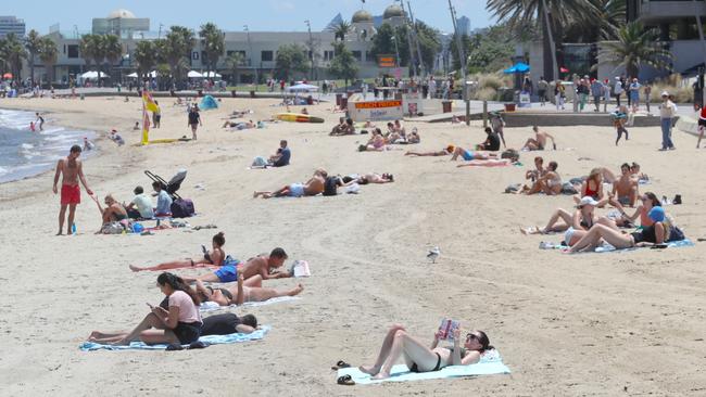 Hundreds of people flocked to St Kilda on Christmas Day. Picture: David Crosling