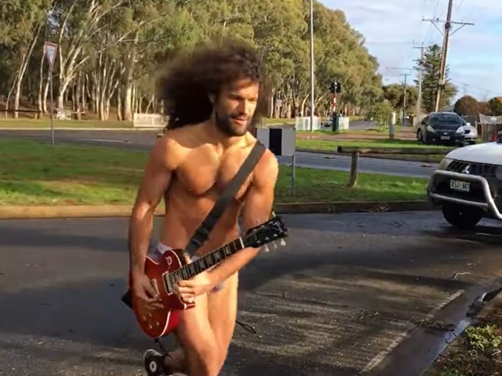 Savas “Subb” Caruso, 32, plays his acoustic guitar and performs in his street every Sunday. Picture: Facebook