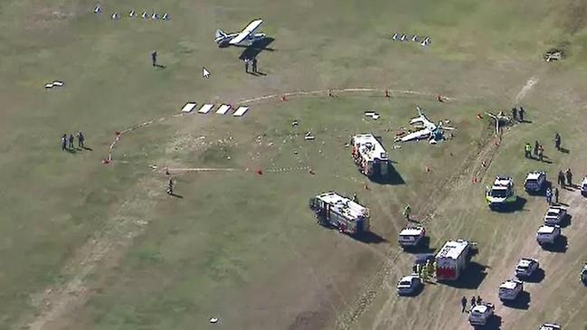 The scene with emergency services attending the mid-air collision which killed David and Jan Maddern on July 28. Source: 9 News