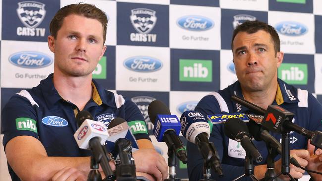 Geelong recruit Patrick Dangerfield faces the media with Cats coach Brad Scott.