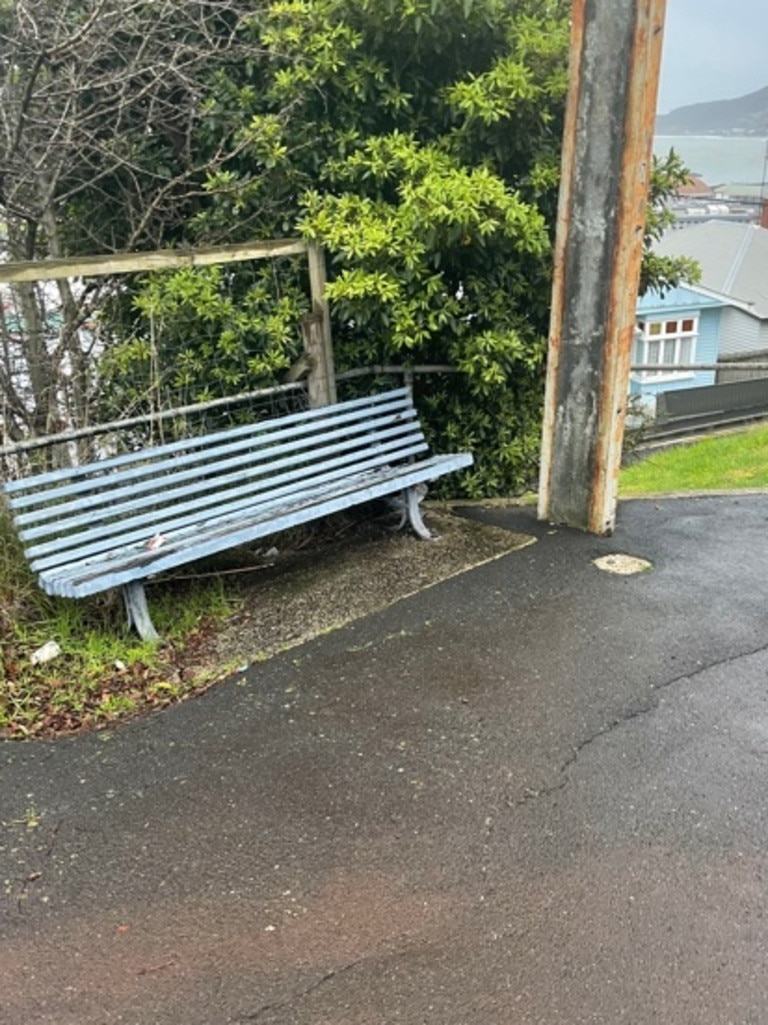 The public bench is one of the things on his property.