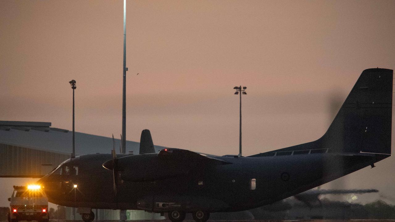 The bodies of three American Marines Corporal Spencer Collart, 21, Captain Eleanor LeBeau, 29 and Major Tobin Lewis, 37, arrive back in Darwin following a fatal Osprey crash near Pickataramoor, Tiwi Islands on Sunday August 27. Picture: Pema Tamang Pakhrin