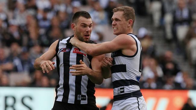 Geelong captain Joel Selwood locking horns with Collingwood midfielder Levi Greenwood. Picture: Wayne Ludbey