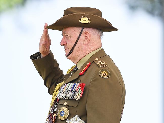 The former Governor-general of Australia Sir Peter Cosgrove salutes during the Consecration and Presentation of Colours Parade for the Australian Army 5th Battalion, the Royal Australian Regiment at the Cenotaph, Bicentennial Park, the Esplanade, Saturday, June 1, 2019. Picture: Keri Megelus