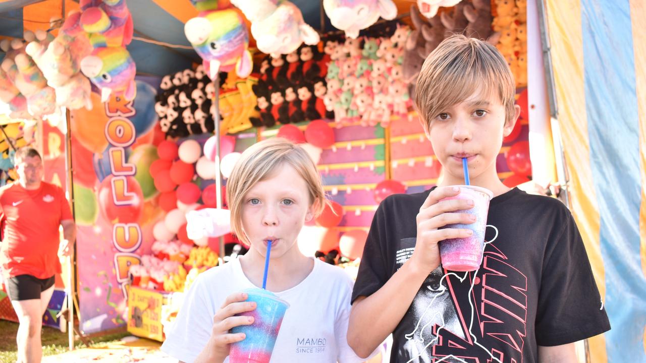 Hamish Peel of Cannonvale and Ryder Robinson of Strathdickie slurping on slushies at Show Whitsunday on Friday. Picture: Kirra Grimes