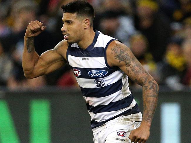 Tim Kelly of the Cats celebrates after kicking a goal during the Round 20 AFL match between the Richmond Tigers and the Geelong Cats at the MCG in Melbourne, Friday, August 3, 2018. (AAP Image/Hamish Blair) NO ARCHIVING, EDITORIAL USE ONLY