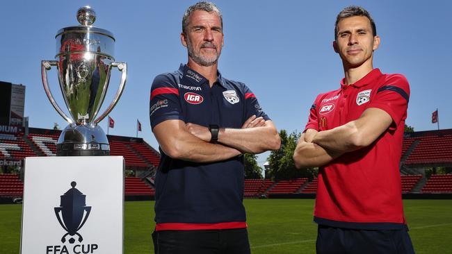 Adelaide United coach Marco Kurz and captain Isaias with the FFA Cup at Coopers Stadium. Picture: Sarah Reed