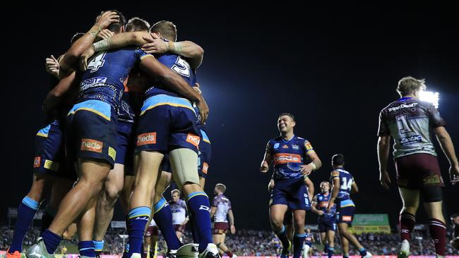 Titans players celebrate a try. Picture: Getty Images