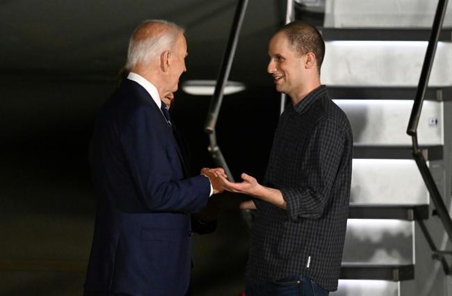 Journalist Evan Gershkovich is welcomed by US President Joe Biden and Vice President Kamala Harris as he arrives at Joint Base Andrews in Maryland on August 1, 2024