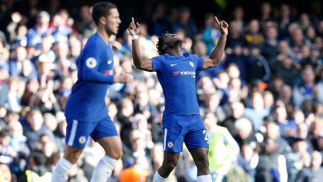 Chelsea's Belgian striker Michy Batshuayi (R) celebrates scoring his team's second goal