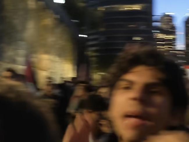 A screengrab of Mr Buttgieg's son pictured chanting "free Palestine" at the Sydney Opera House.