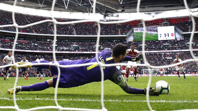 Arsenal’s Pierre-Emerick Aubameyang has his penalty saved by Tottenham goalkeeper Hugo Lloris at Wembley. Picture: Getty Images