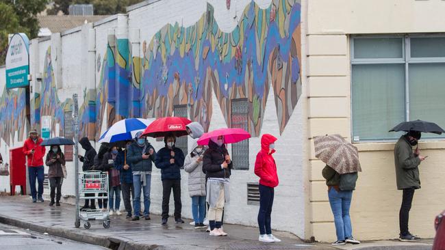 People line up at a Covid testing clinic in Collingwood in Melbourne's inner north.