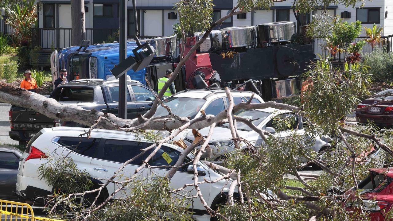 ‘Very scary’: Remote control crane topples crushing cars at uni park