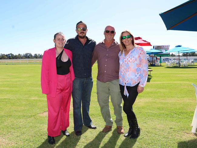 BAIRNSDALE, AUSTRALIA – MARCH 22 2024 Lexia Pierce, Logan Stewart, Aaron Jowett and Hayley Jowett attend the Bairnsdale Cup race day. Picture: Brendan Beckett