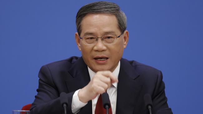 Li Qiang holds his first press conference as premier at Beijing’s Great Hall of the People on Monday. Picture: Getty Images