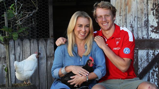 Callum Mills, 19, with his mother, Simone, at his family property at Terry Hills. Pic: Phil Hillyard