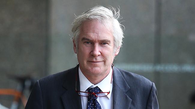 Former Fair Work vice-president Michael Lawler should have been sacked, says a report by barrister Peter Heerey.