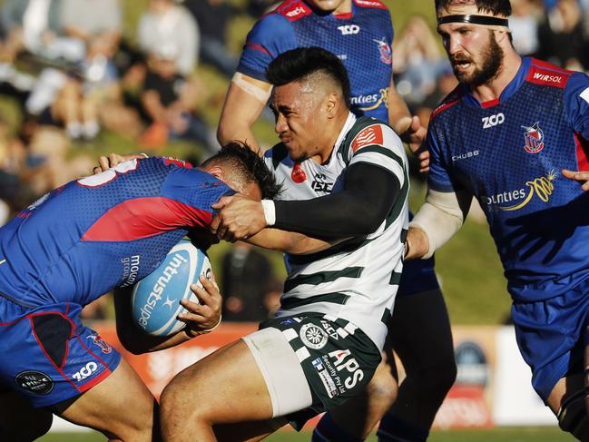 Warringahâ€™s Charlie Tupu seizes Manlyâ€™s Dennis Pili-Gaitau as Manlyâ€™s Alex Dalzell comes in to support. Warringah v Manly (Northern Beaches Derby 2), Shute Shield Rd 16 at Pittwater Rugby Park. Rats def Marlins 28-23. Saturday 20th July 2019.  Â© Karen Watson