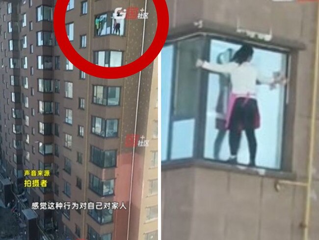 Women wash windows on 11th floor building in China without harness. Picture: Douyin