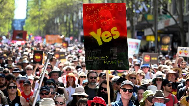 Crowds march during a "Walk for Yes" rally in Melbourne on Sunday. Picture: William WEST/AFP