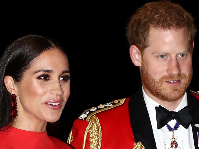 In this file photo taken on March 07, 2020 Britain's Prince Harry, Duke of Sussex and Meghan, Duchess of Sussex arrive to attend The Mountbatten Festival of Music at the Royal Albert Hall in London. - Britain's Prince Harry, Duke of Sussex, and Meghan, Duchess of Sussex have left Canada to set up home in California, according to reports. (Photo by SIMON DAWSON / POOL / AFP)