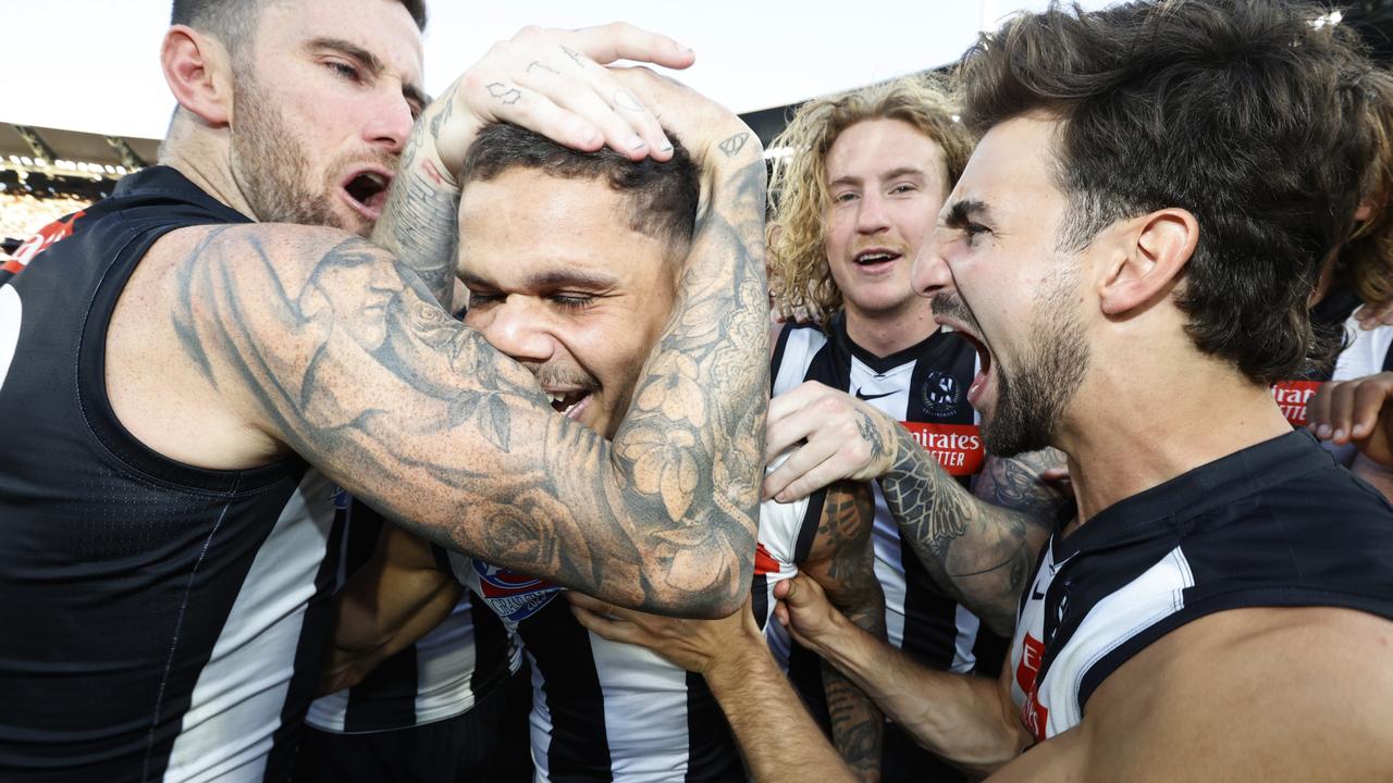 Teammates congratulate Norm Smith medallist Bobby Hill. Picture: Darrian Traynor/AFL Photos/via Getty Images