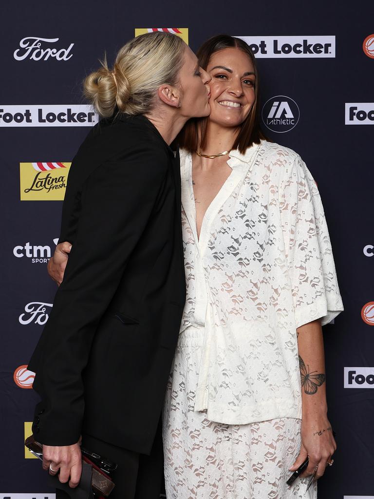 The Flames’ Lauren Jackson and Cayla George ham it up on the red carpet. Photo by Graham Denholm/Getty Images for WNBL