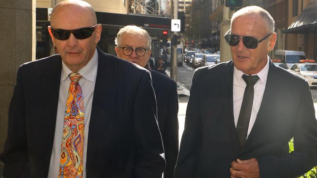 Dawson with his brother and lawyer Greg Walsh. Picture: MATRIX