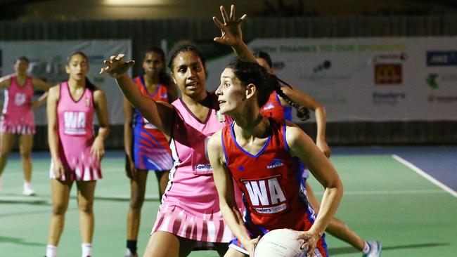 Sharks's Amanda Barton looks for space in the Cairns Netball division one semii final match between the Cairns Sharks and the Cairns Leprechauns, held at the Martyn Street Sports Park, Manunda. PICTURE: BRENDAN RADKE