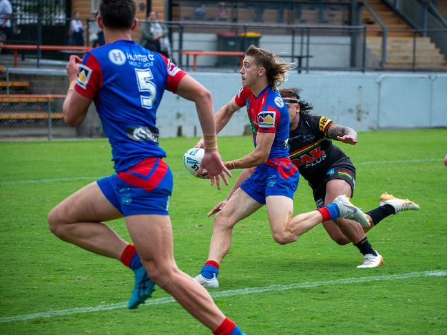 Fletcher Sharpe throws a pass for his winger to score. Picture: Thomas Lisson