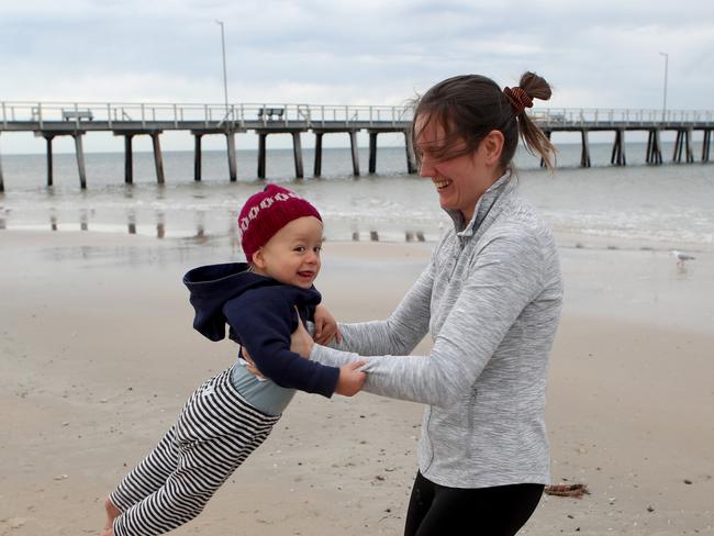 ADELAIDE, AUSTRALIA - NewsWire Photos September 20 2022: Ellie Beasy with son Tommy (18mths) enjoying the warmer weather at Henley Beach. Picture: NCA NewsWire / Kelly Barnes