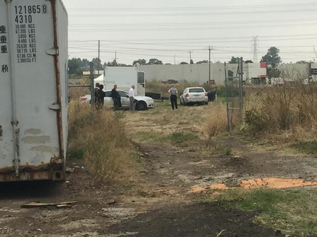 Police at the industrial site and former rubbish dump where the remains of Terrence Blewitt were found. Picture: AAP