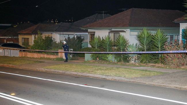 Police tape around the house on Marco Ave, Revesby, where the shots were allegedly fired last November. Picture: Dean Asher