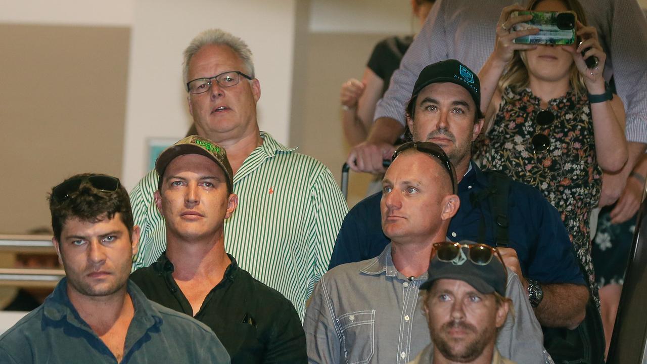 Matt Wright arrives in Darwin flanked by security. Picture: Glenn Campbell