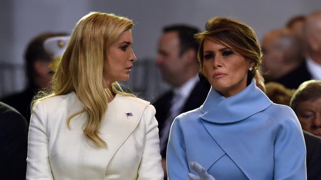 First Lady Melania Trump speaks with Ivanka Trump during the presidential inaugural parade for US President Donald Trump on January 20, 2017. Picture: AFP