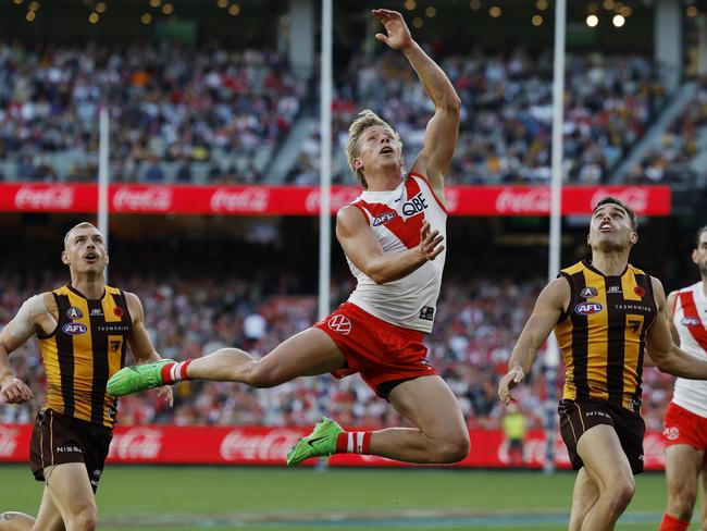 Isaac Heeney flies against the Hawks last year. Picture: Michael Klein