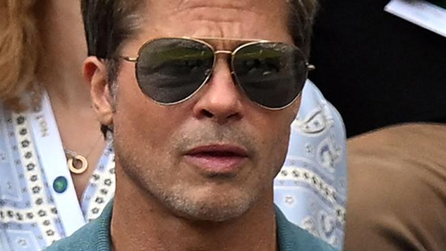 Brad Pitt watches the action. Picture: Glyn Kirk/AFP