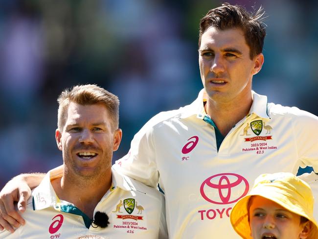 SYDNEY, AUSTRALIA - JANUARY 03: David Warner, Pat Cummins, Steve Smith and Travis Head of Australia sign the national anthem prior to the start of play on day one of the Men's Third Test Match in the series between Australia and Pakistan at Sydney Cricket Ground on January 03, 2024 in Sydney, Australia. (Photo by Darrian Traynor/Getty Images)