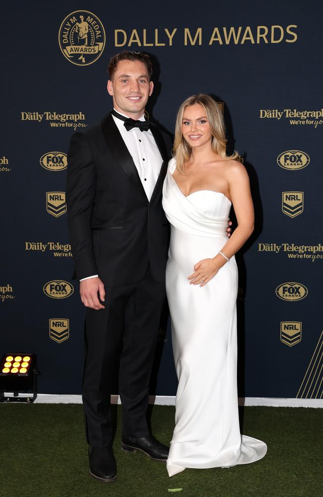 Cameron Murray of the Rabbitohs and partner Miranda Cross took to the carpet just one month after announcing they are expecting a baby girl. (Photo by Mark Kolbe/Getty Images)