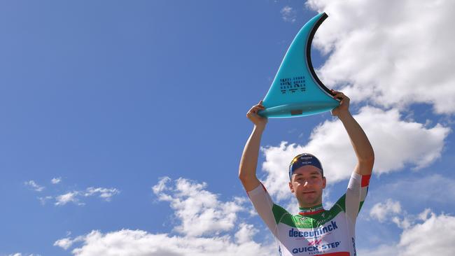 Elia Viviani holds his trophy aloft after the Cadel Evans Great Ocean Road Race. Pic: Getty Images