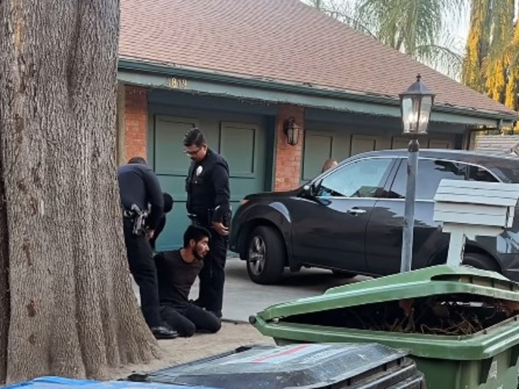 LA residents use zip ties to restrain a suspected arsonist before calling police. Picture: Instagram