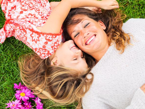 RendezView. Happy mother and daughter relaxing outside. (Pic: iStock)