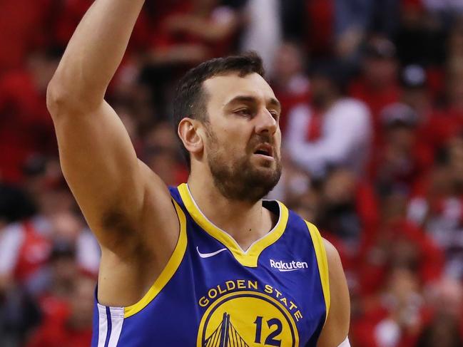 TORONTO, ONTARIO - JUNE 02: Andrew Bogut #12 of the Golden State Warriors reacts against the Toronto Raptors in the second half during Game Two of the 2019 NBA Finals at Scotiabank Arena on June 02, 2019 in Toronto, Canada. NOTE TO USER: User expressly acknowledges and agrees that, by downloading and or using this photograph, User is consenting to the terms and conditions of the Getty Images License Agreement.   Gregory Shamus/Getty Images/AFP == FOR NEWSPAPERS, INTERNET, TELCOS & TELEVISION USE ONLY ==