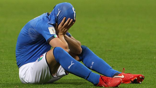 Alessandro Florenzi of Italy reacts after failing to qualify for the World Cup.